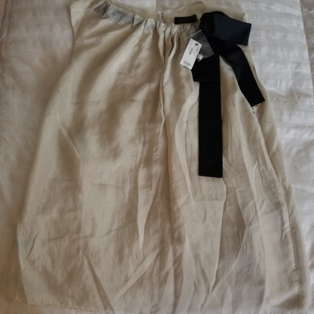 Evening blouse semi shiny cream color w/black bow